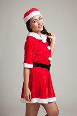 Asian Christmas girl with Santa Claus clothes