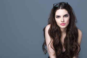 Portrait of beautiful brunette woman.