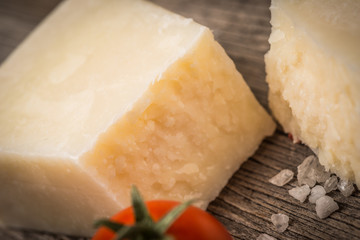 Cheese on papper  on wooden background