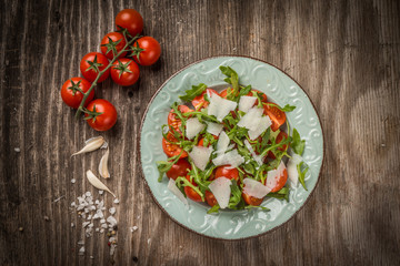 Rocket salad with cherry tomato and pecorino