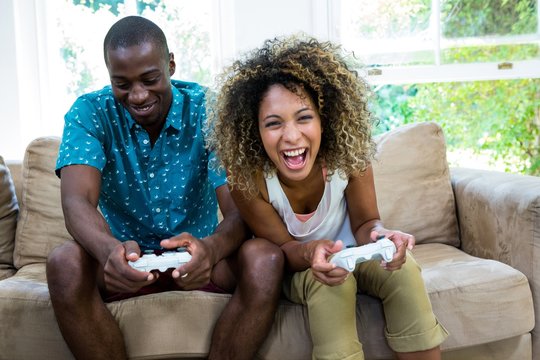 Young Couple Playing Video Game