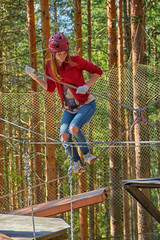 Girl in a Forest Rope Park Challenge