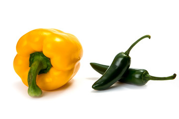 Jalapeno hot pepper and paprika on a white background