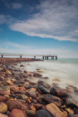Pier in the pebbles beach