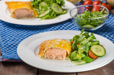 Salmon baked in puff pastry