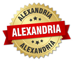 Alexandria round golden badge with red ribbon