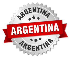 Obraz premium Argentina round silver badge with red ribbon