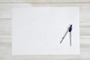 Engineering divider on a white paper.