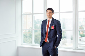 Confident Groom alone indoor 