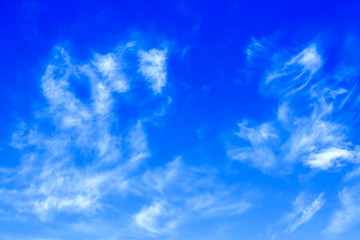Fototapeta na wymiar Clouds on clear blue sky background