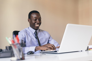 Young African Businessman Working.