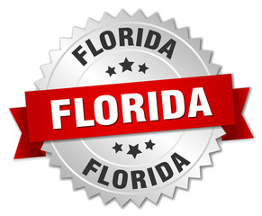 Florida  round silver badge with red ribbon