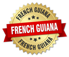 French Guiana round golden badge with red ribbon
