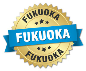 Fukuoka round golden badge with blue ribbon