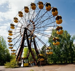 Famous ferris wheel in abandoned amusement park in Pripyat town in Chernobyl Exclusion Zone, place...
