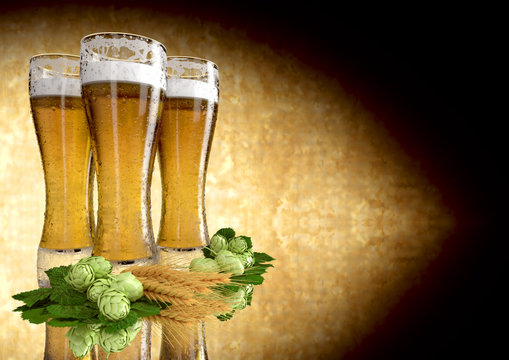 three glasses of beer with barley and hops - 3D render