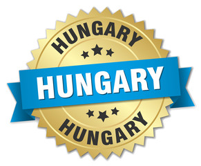 Obraz premium Hungary round golden badge with blue ribbon