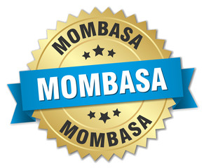 Mombasa round golden badge with blue ribbon