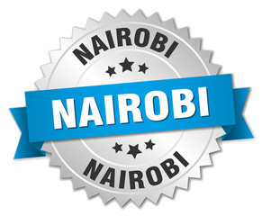 Nairobi round silver badge with blue ribbon