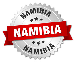 Namibia  round silver badge with red ribbon