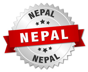 Nepal round silver badge with red ribbon