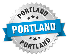 Portland round silver badge with blue ribbon