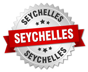 Seychelles  round silver badge with red ribbon