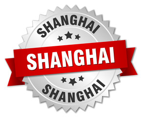 Shanghai  round silver badge with red ribbon