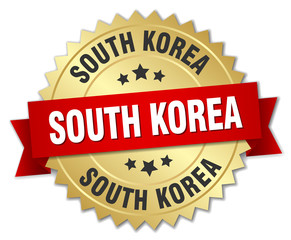 South Korea round golden badge with red ribbon