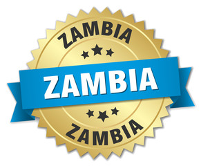 Zambia round golden badge with blue ribbon
