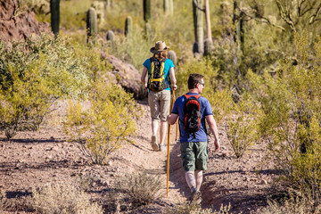 Desert Hikers on Rugged Trail