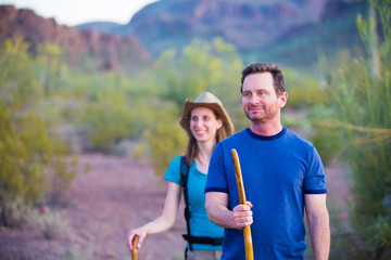Naklejka premium Desert Hikers on Mountain Path