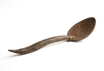 Spoon  made from coconut shell on white background