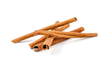 Fragrant cinnamon sticks isolated on white background