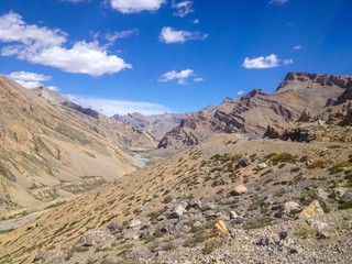 Fototapeta na wymiar Pick-up truck at Leh - Manali road landscape view, Ladakh, India