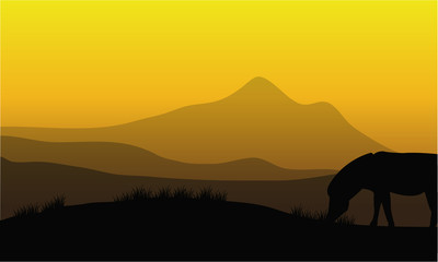 Fototapeta na wymiar Zebra silhouette with mountain backgrounds