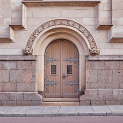 impressive arched entrance of a vintage building, Germany