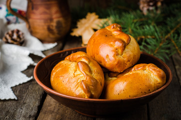 Pies stuffed meat on wooden background, ukrainian or russian cuisine. Selective focus