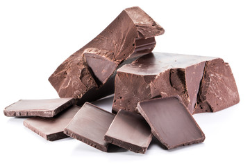 Chocolate blocks and pieces of chocolate bar isolated on a white