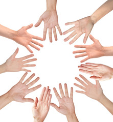 Group of people hands together, looking up view, isolated on whi