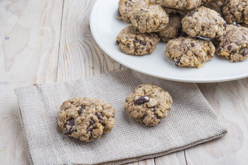 Oat and peanut butter cookies with pumpkin seeds and cinnamon