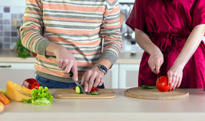 Family cooking Salad together