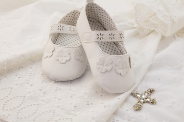 White christening baby booties, crystal cross pendant on white