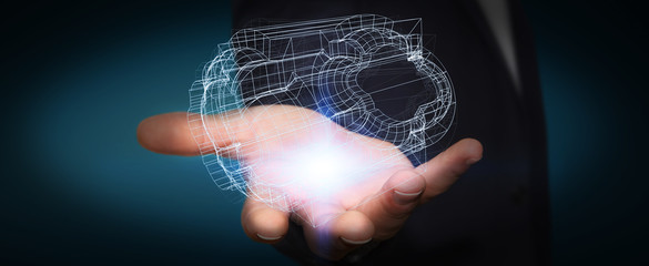 Businessman holding digital 3D engine