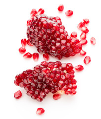 Ripe pomegranate fruit segment isolated on white background cuto