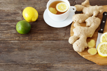 cup of ginger tea on a wooden table