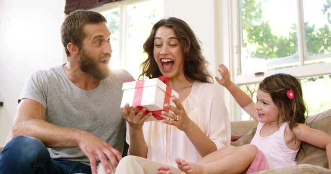 Excited mother receiving a gift