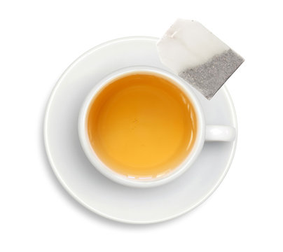 white cup with tea and tea bag isolated on white