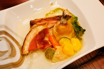 Chicken leg with grilled bacon