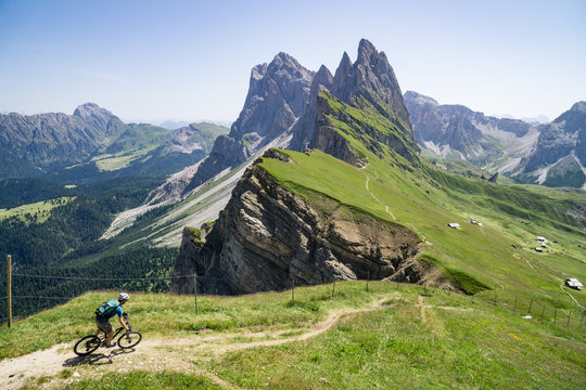 A man riding his mountain bike along trail, Dolomites, italy